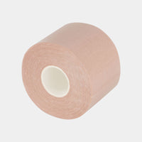 Adhesive Body Tape Roll in Nude. Flat lay front view