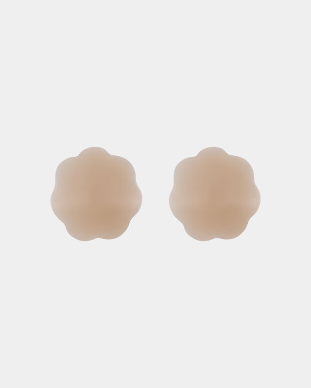 Silicone Gel Covers Nipple Covers in Nude. Flat lay front view