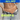 Promotional image of lace briefs with a discount offer on a gray background