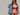 mobile alternative for Woman wearing a red bralette with a denim jacket on a gray background