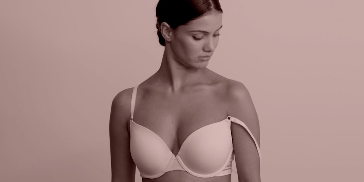 model-wearing-bra-with-strap-falling-down