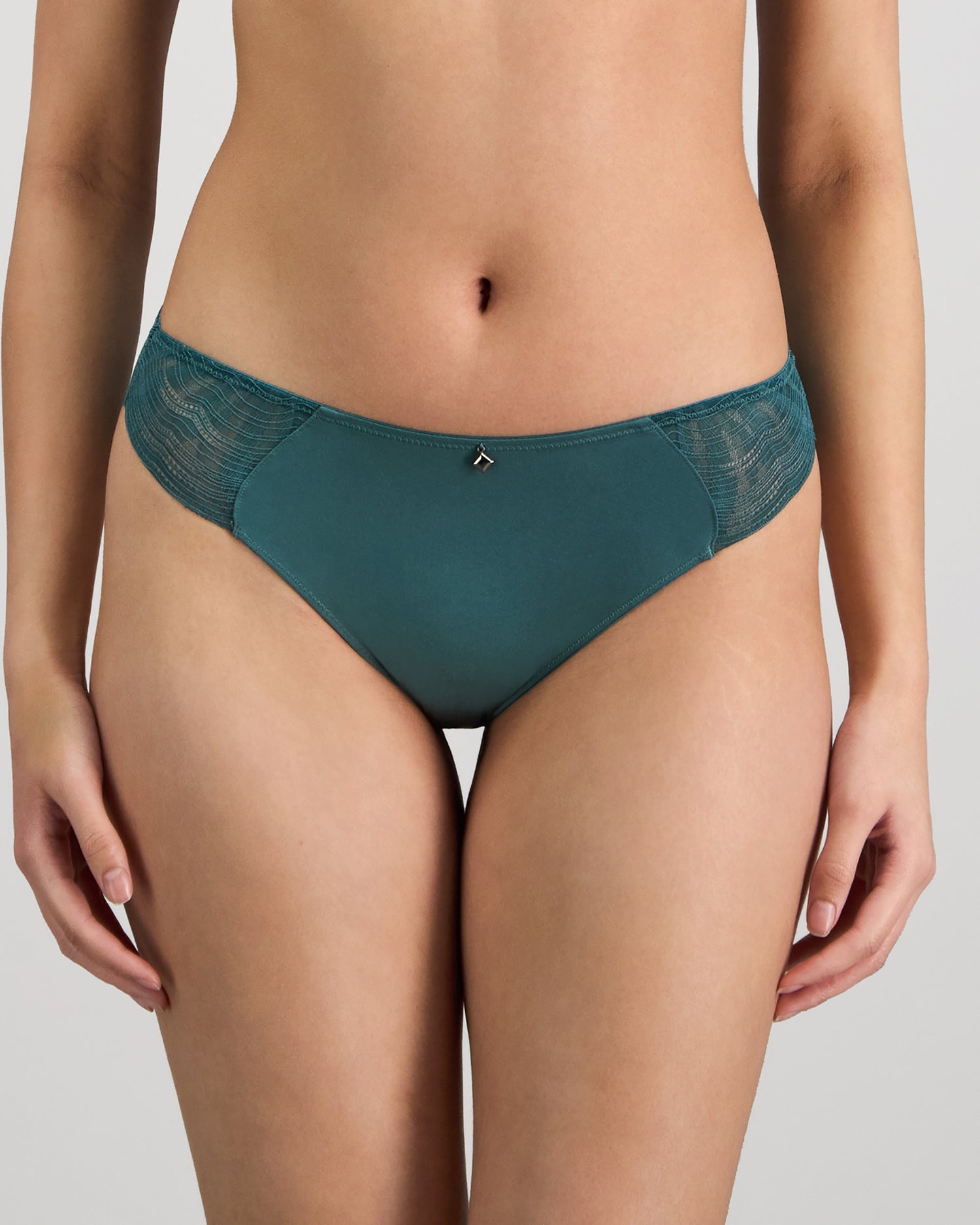 Model wears Coco Divine Bikini in MEDITERRANEA. On body front view