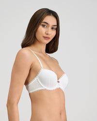 Model wears Body Cocoon Contour Bra in WHITE. On body side view