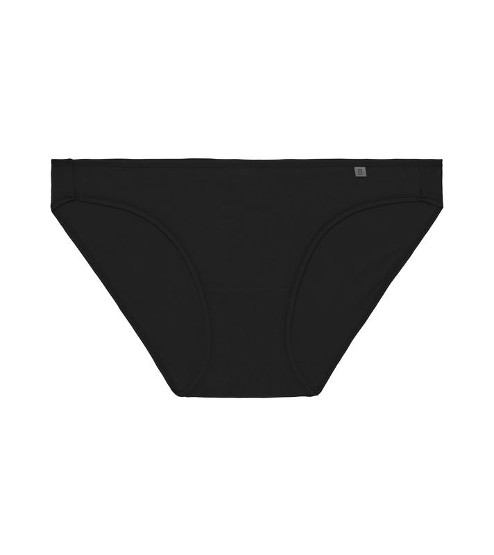 Model wears Clemence Bikini in BLACK. On body front view