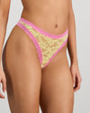 Model wears Leo Thong in LEMON/FUCHSIA PINK. On body side view