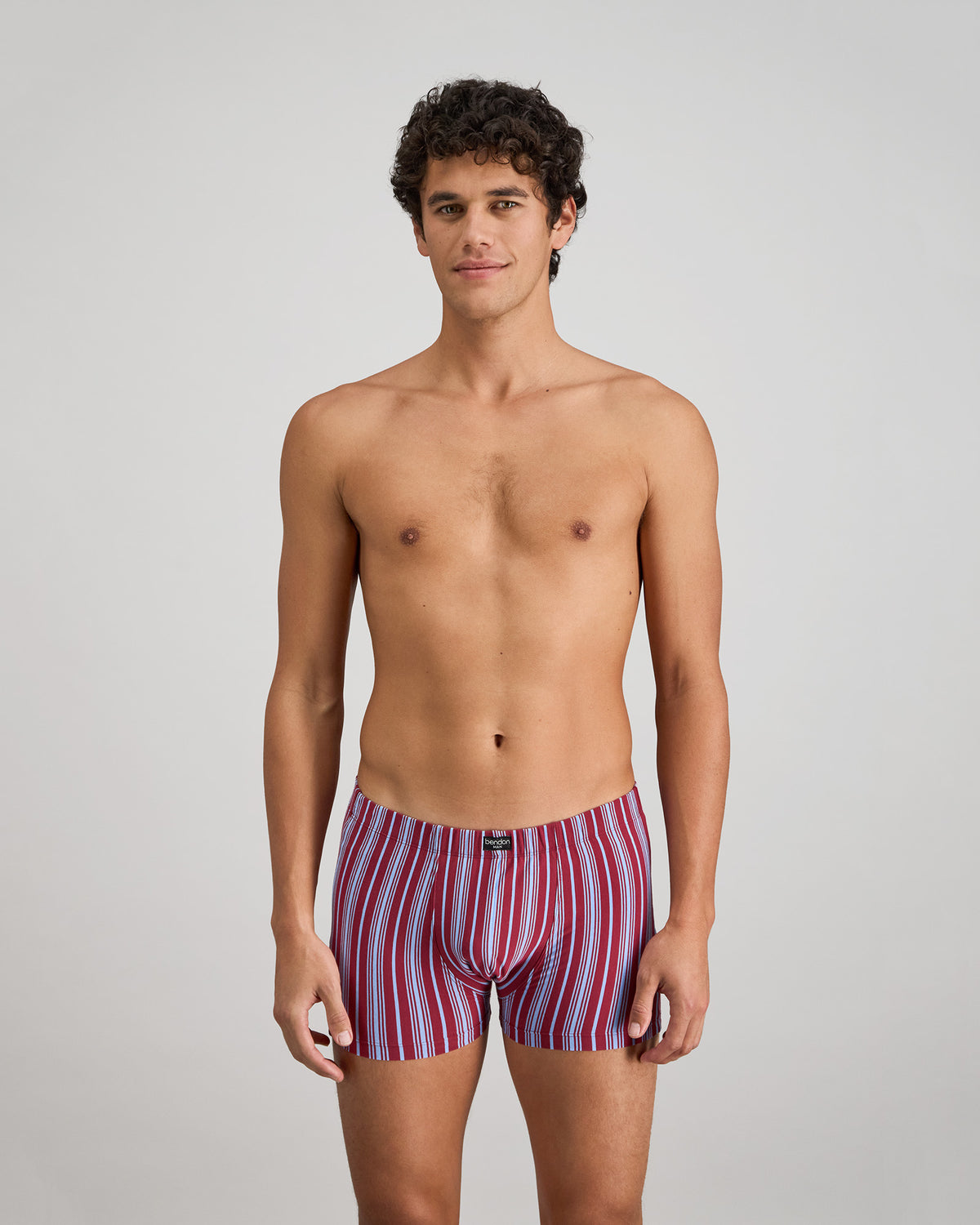 Cotton Stretch Mens Trunk in TIBETAN RED STRIPE. Feature shot