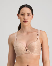 Model wears Damask Contour Bra in LATTE. On body front view