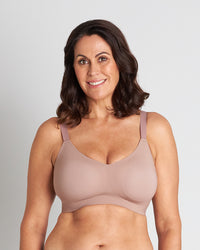 Model wears Comfit Collection Wire Free Bra in MOCHA. On body front view