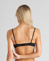 Model wears Sofia Underwire Bra in BLACK. On body back view