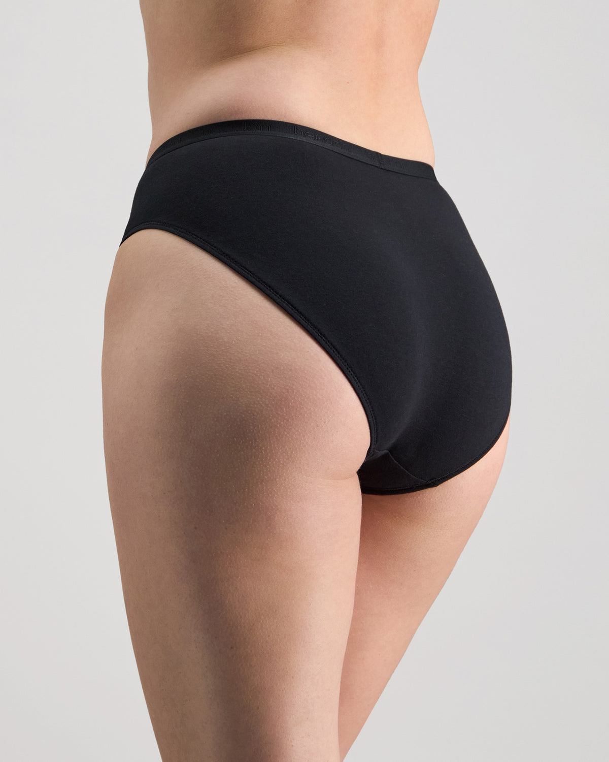 Body Cotton High Cut Brief in BLACK. Flat lay back view