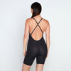Model wears Medium Control Jumpsuit in BLACK. On body back view