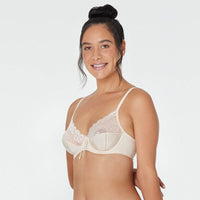 Model wears Yvette Underwire Bra in NATURAL. On body side view