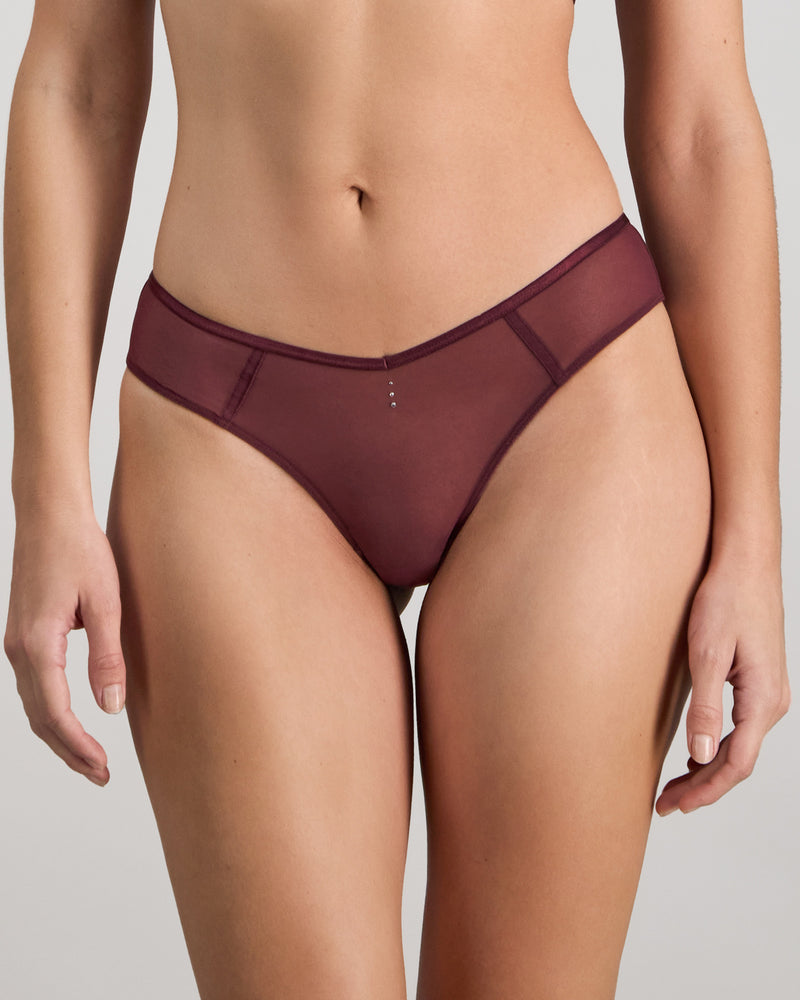 Model wears Sheer Impact Brazilian in FIG. On body front view