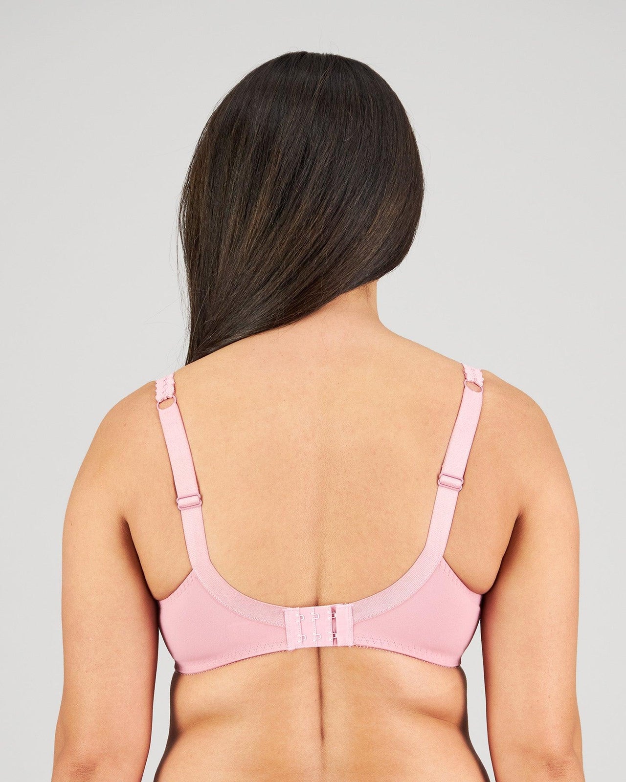 Model wears Coral Underwire Bra in LILAS. On body back view
