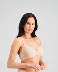 Model wears Comfit Collection Contour Bra in LATTE. On body side view