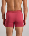 Model wears Bamboo Mens Trunk in GARNET. On body back view