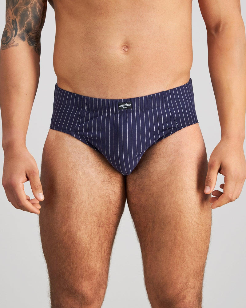 Model wears Cotton Stretch Mens Brief in PEACOAT PINSTRIPE. On body front view