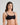 Model wears Extra-Ordinary Contour Bra in BLACK. On body side view