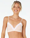Model wears Nikki Wire Free Bra in SPANISH VILLA/WHITE. On body front view