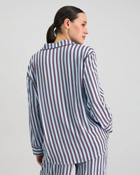 Model wears Cabana Stripe Long Sleeve Pj Top in COOL BLUE. On body back view