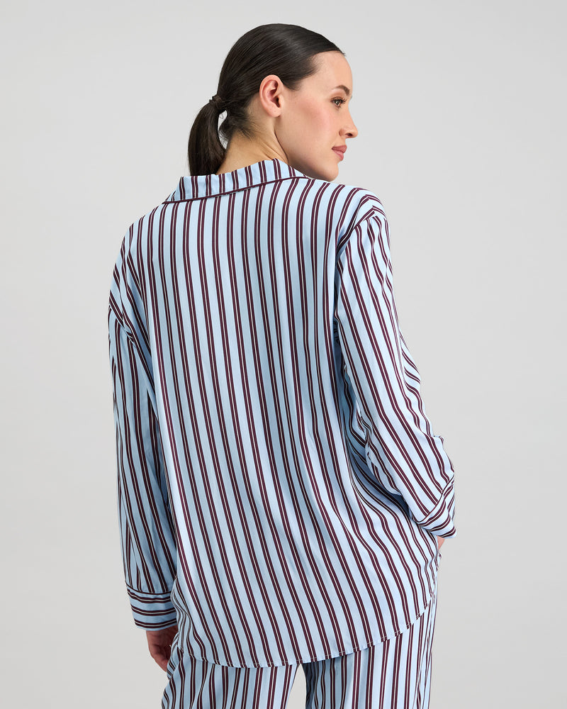 Model wears Cabana Stripe Long Sleeve Pj Top in COOL BLUE. On body back view