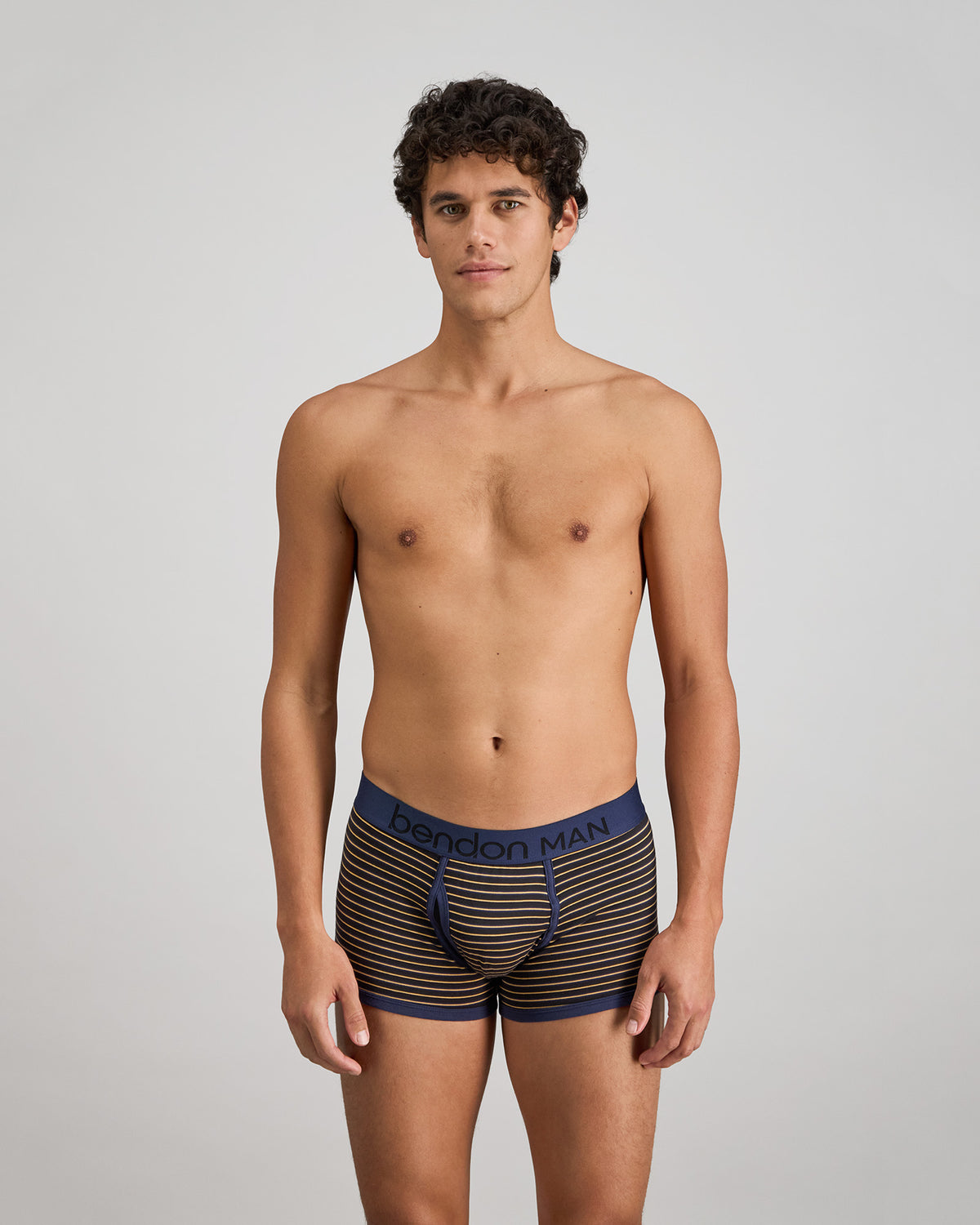 Bold Stripe Mens Trunk in BLACK/OAK BUFF STRIPE. Feature shot