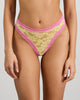 Model wears Leo Thong in LEMON/FUCHSIA PINK. On body front view