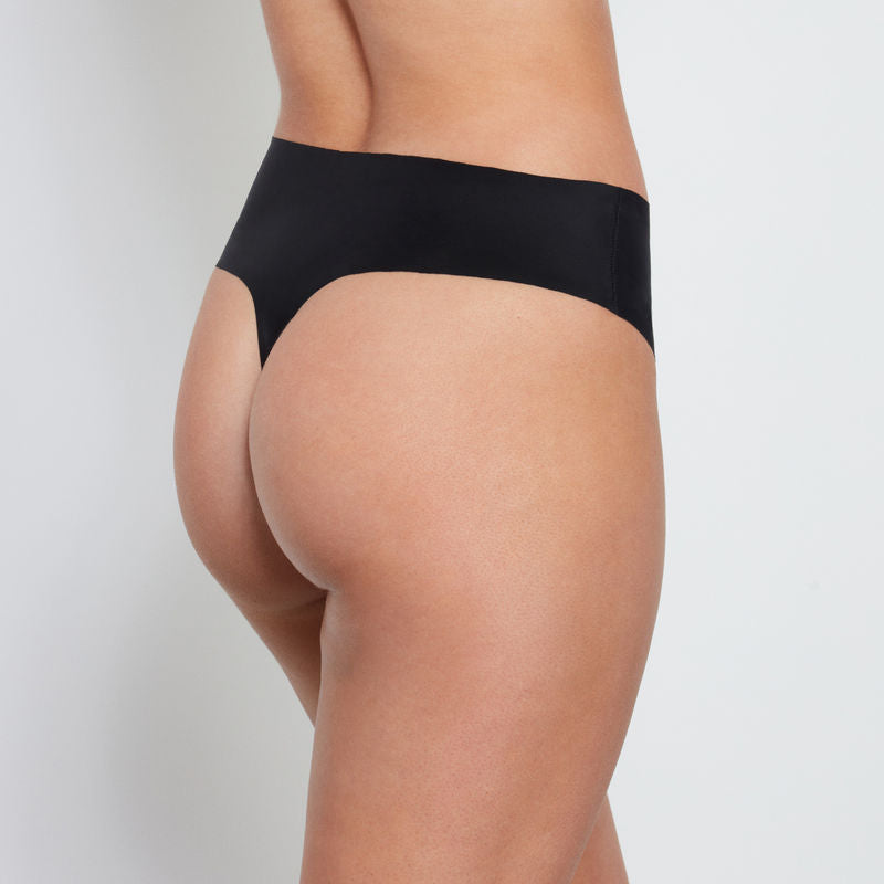 Model wears No Show Thong in BLACK. On body back view