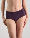 Model wears Au Naturel Full Brief in PLUM PERFECT. On body front view