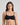 Model wears Extra-Ordinary Contour Bra in BLACK. On body front view