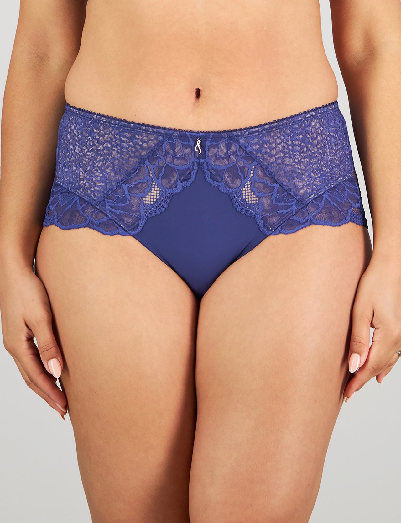 Model wears Midnight Express Full Brief in BLUE RIBBON. On body front view