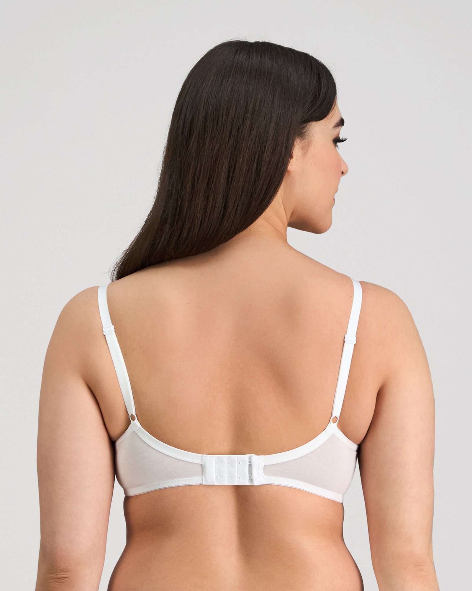 Model wears Embrace Contour Bra in WHITE. On body back view