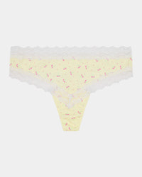 Daily Micro Thong in TRANSPARENT YELLOW. Flat lay front view