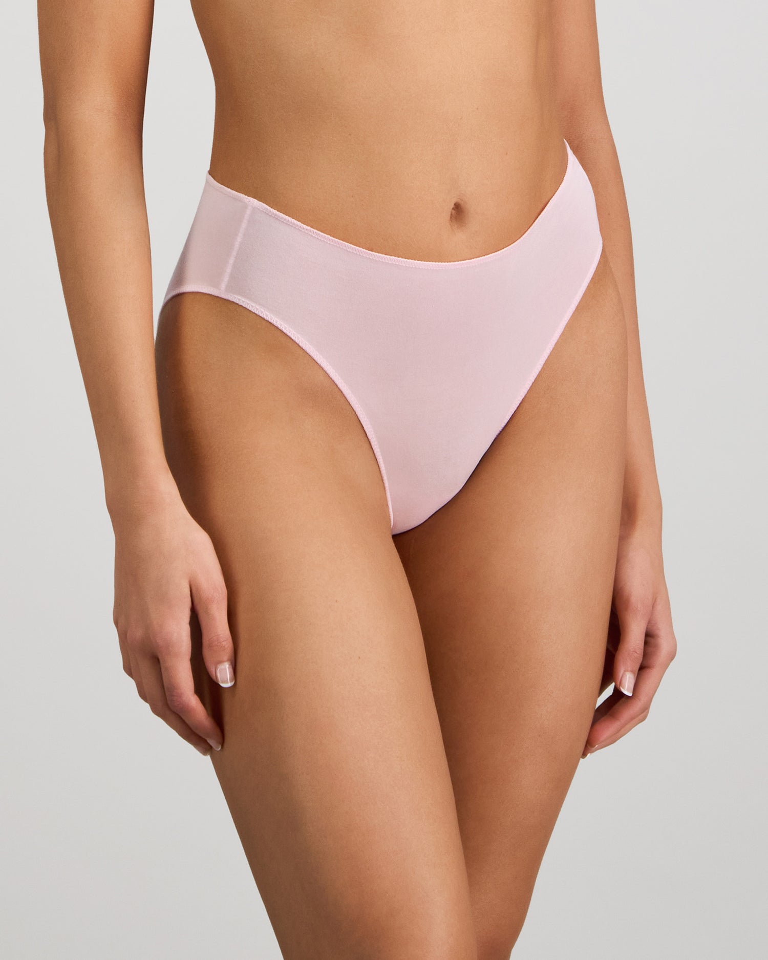 Model wears Au Naturel High Cut Brief in PALE LILAC. On body side view