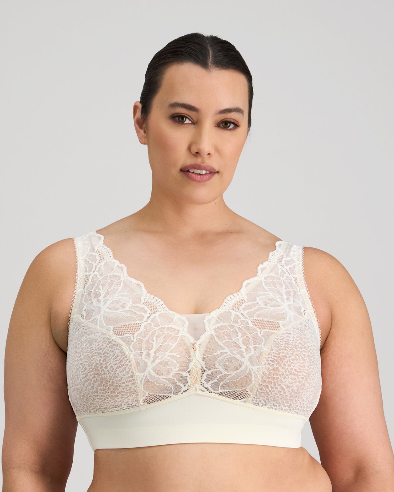 Model wears Midnight Express Wire Free Bra in EGRET. On body front view