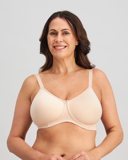 Model wears Bendon Restore Mastectomy Bra in LATTE. On body front view