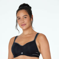 Model wears Active Contour Bra in BLACK. On body front view