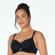 Model wears Active Contour Bra in BLACK. On body front view