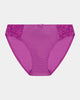 Model wears Baroque Bikini in RADIANT ORCHID. On body front view