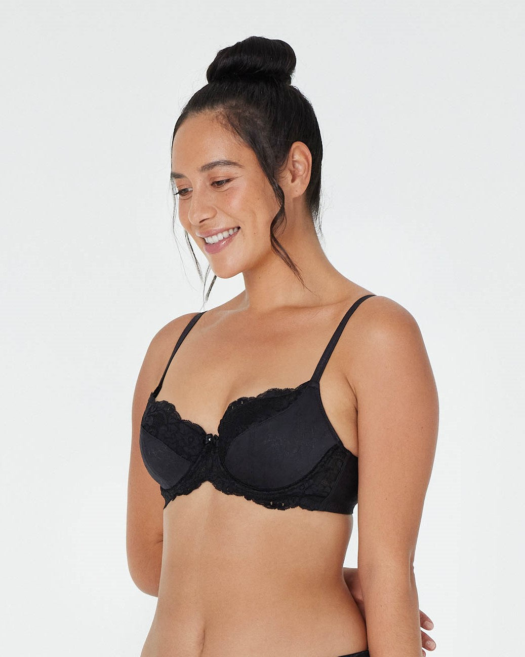 Model wears Body Lace Contour Bra in BLACK. On body side view