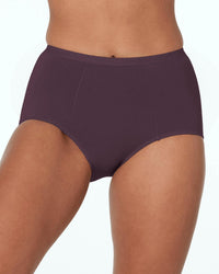 Model wears Body Cotton Full Brief in PLUM PERFECT. On body front view