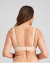 Model wears Comfit Collection Wire Free Bra in LATTE. On body back view