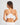 Model wears Simply Seamless Crop Top in WHITE. On body back view