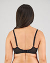 Model wears Magnetism Underwire Bra in BLACK/LATTE. On body back view