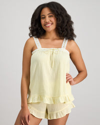 Model wears Bonbon Cami & Short Set in TRANSPARENT YELLOW. On body front view