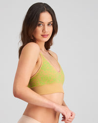 Model wears Inspiration Crop Top in LIME PUNCH LEOPARD PRINT. On body side view