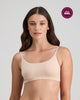Model wears Extra-Ordinary Crop Top in LATTE. On body front view