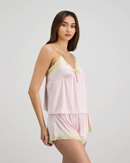 Model wears Dreamer Camisole in PALE LILAC. On body side view