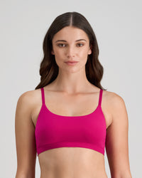 Model wears Extra-Ordinary Crop Top in FANTASY FUCHSIA. On body front view