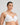 Model wears Sculpt Contour Bra in WHITE. On body side view